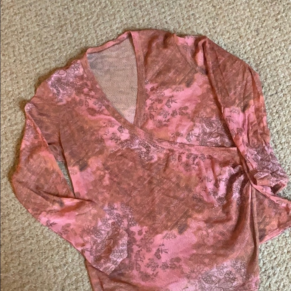 Sheer long sleeve wrap style top